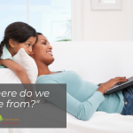 Where do we come from? Image: a child looks over the shoulder of a woman who's lying on a couch with a laptop on her lap.